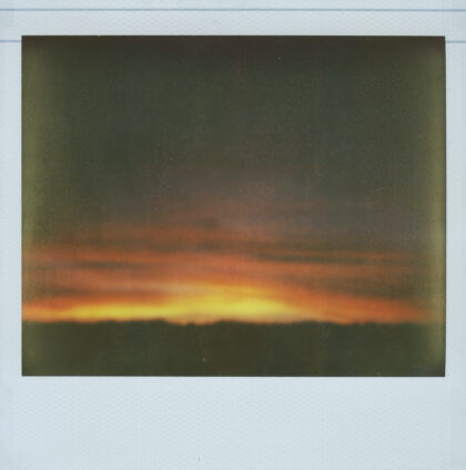 polaroid of an orange sunset
