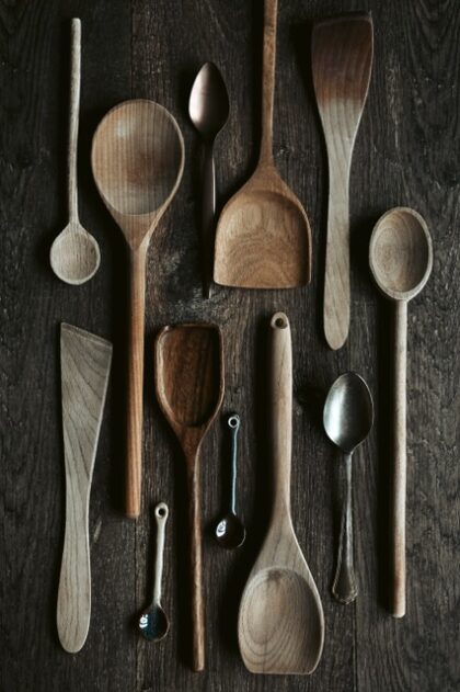 Countertop displaying a variety of wooden spoons