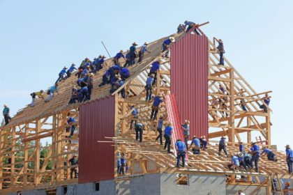 People working together to build a house