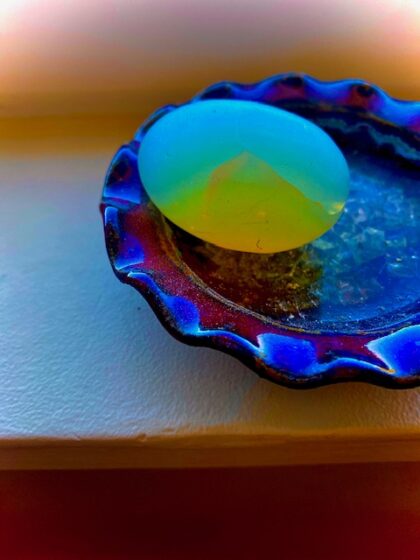 blue dish on a brown table
